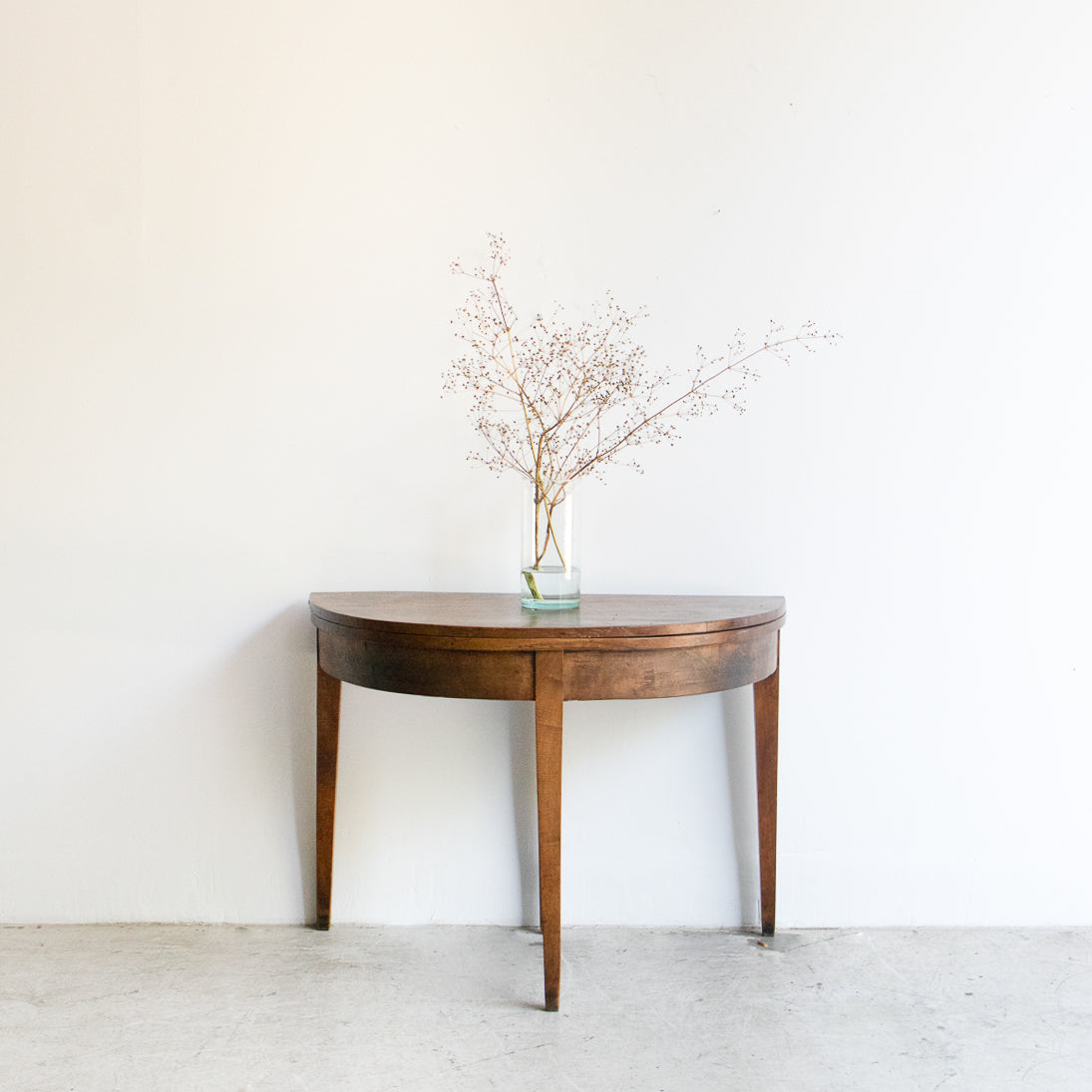 Table pliante demi-lune en noyer