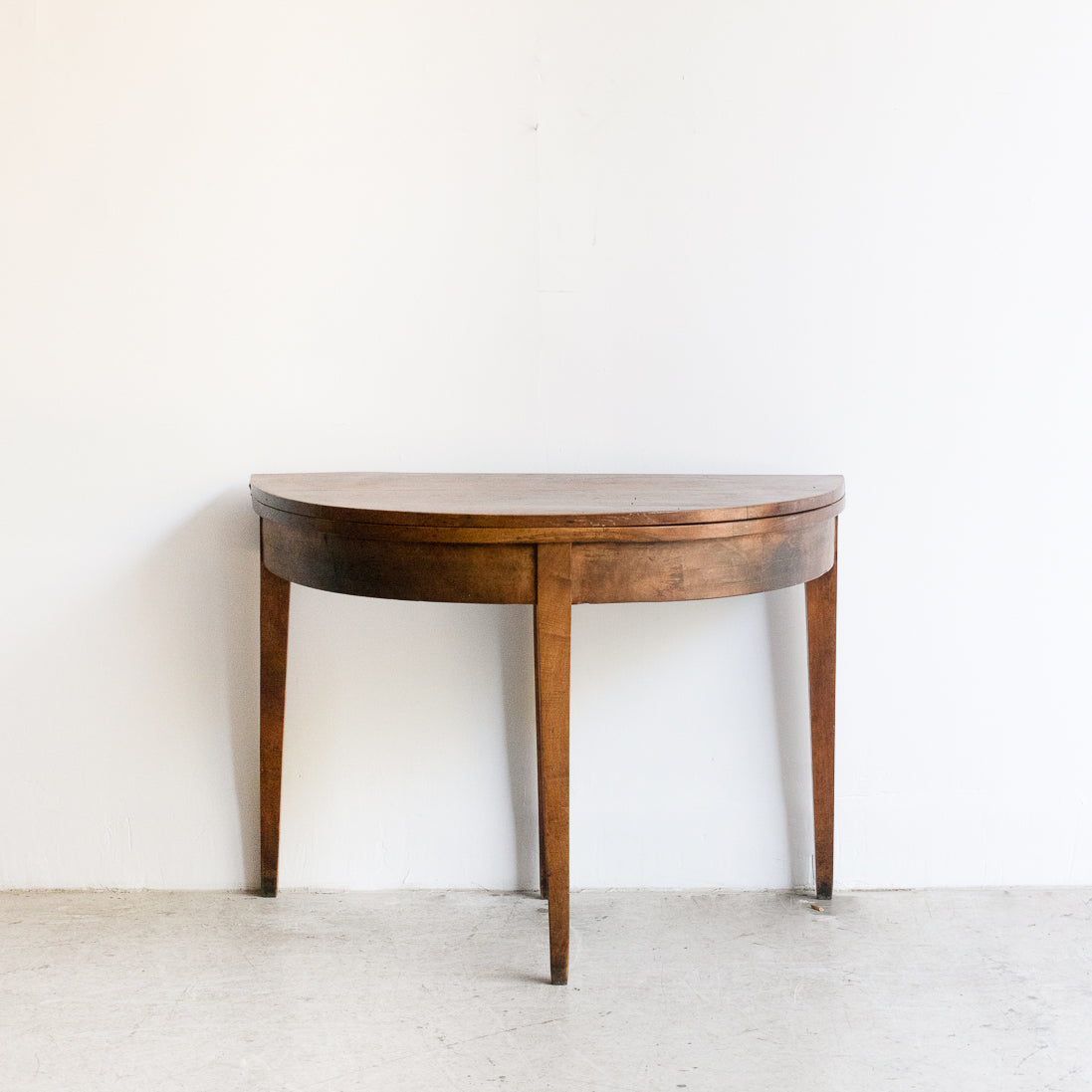 Table pliante demi-lune en noyer