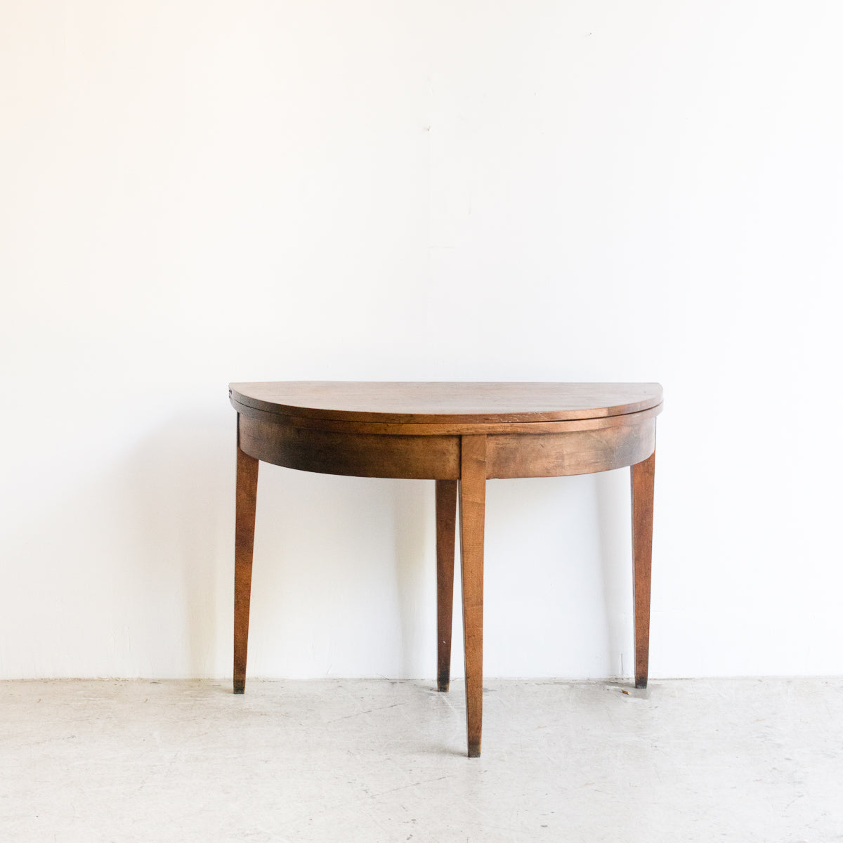 Table pliante demi-lune en noyer