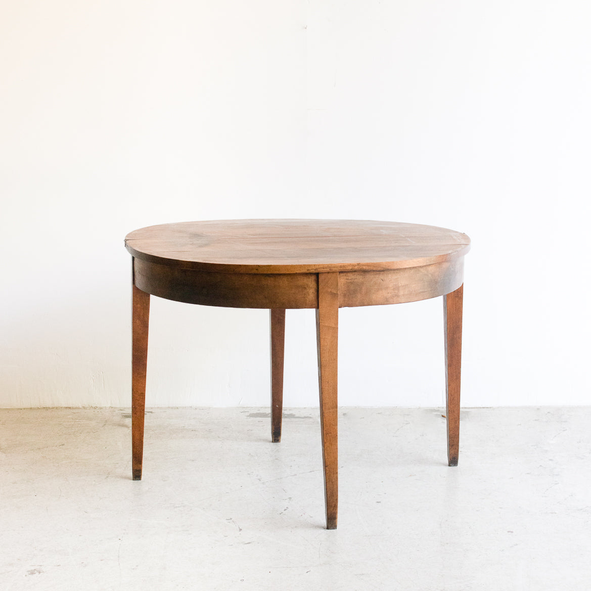 Table pliante demi-lune en noyer
