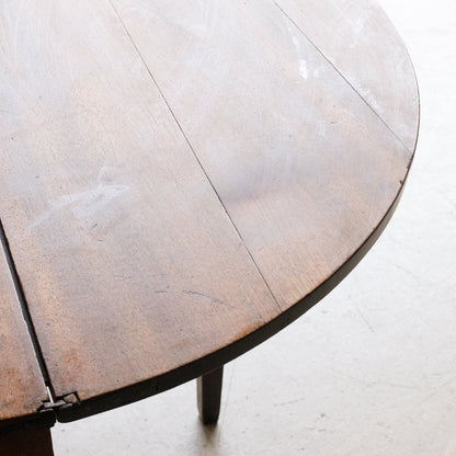 Table pliante demi-lune en noyer