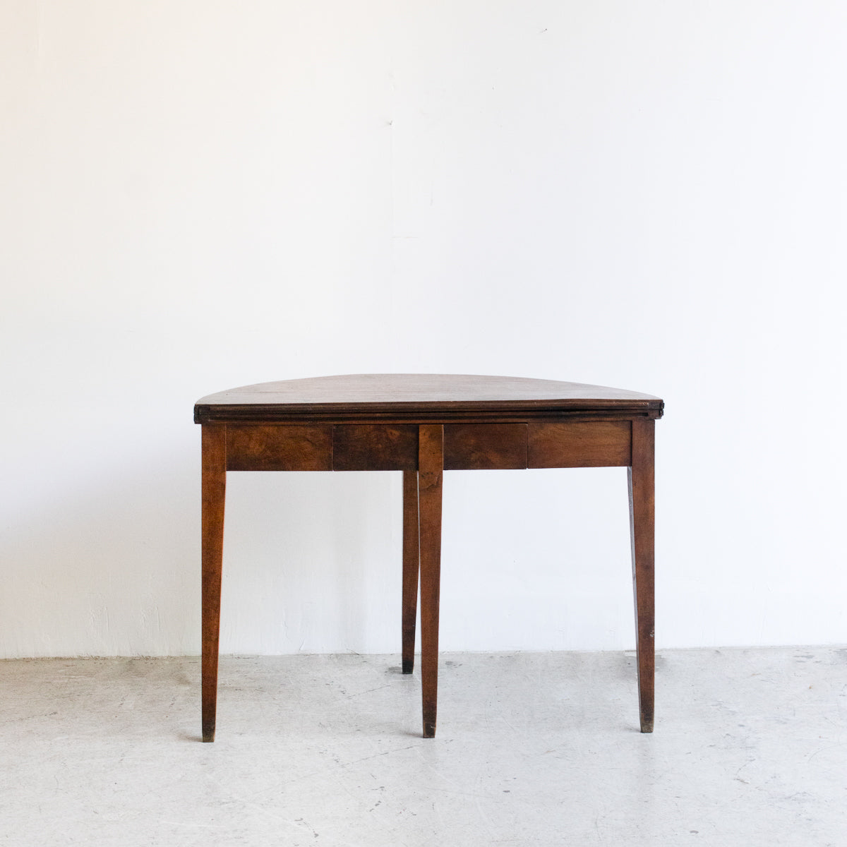 Table pliante demi-lune en noyer